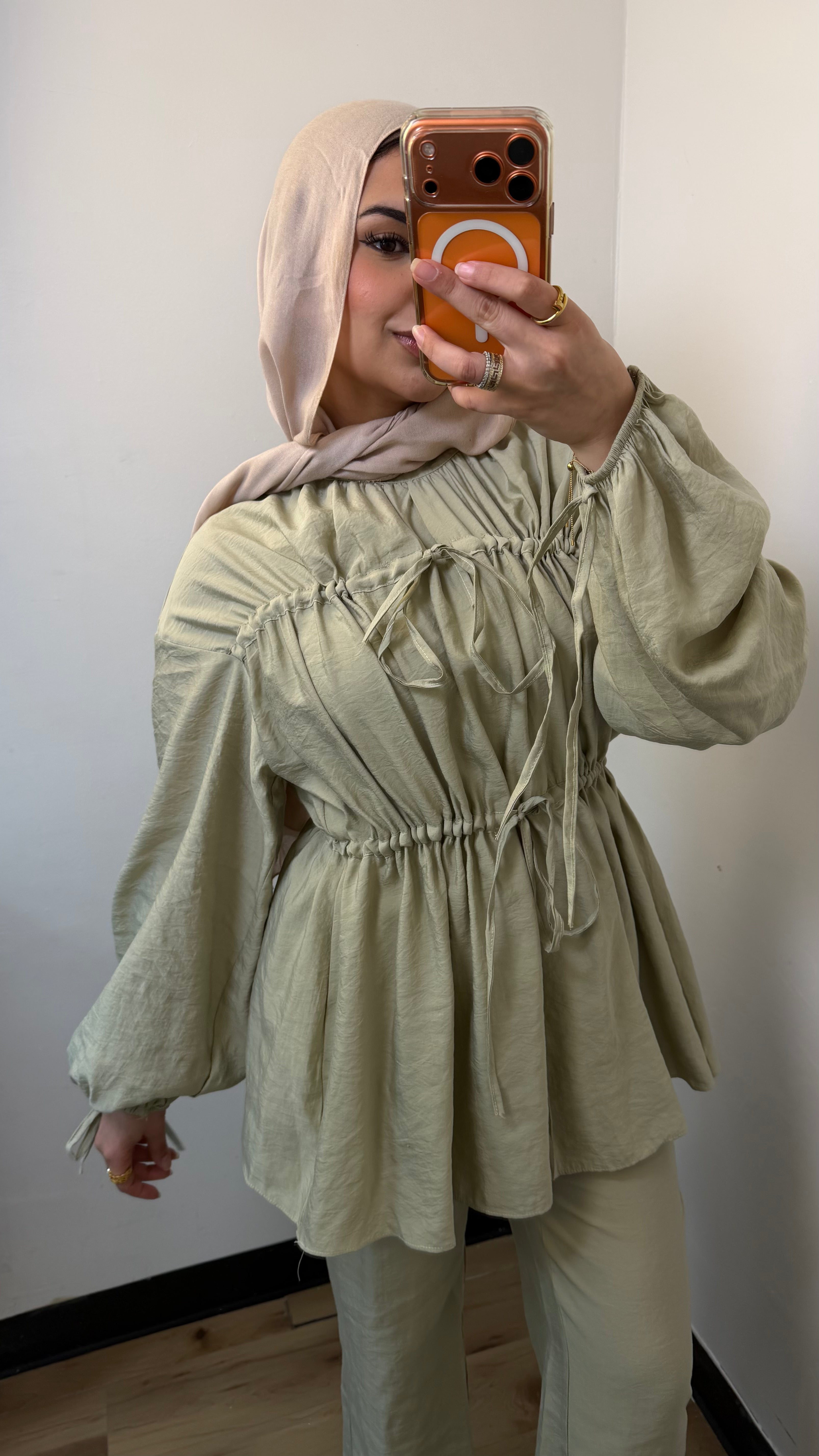 Nura Drawstring Ruffle Top