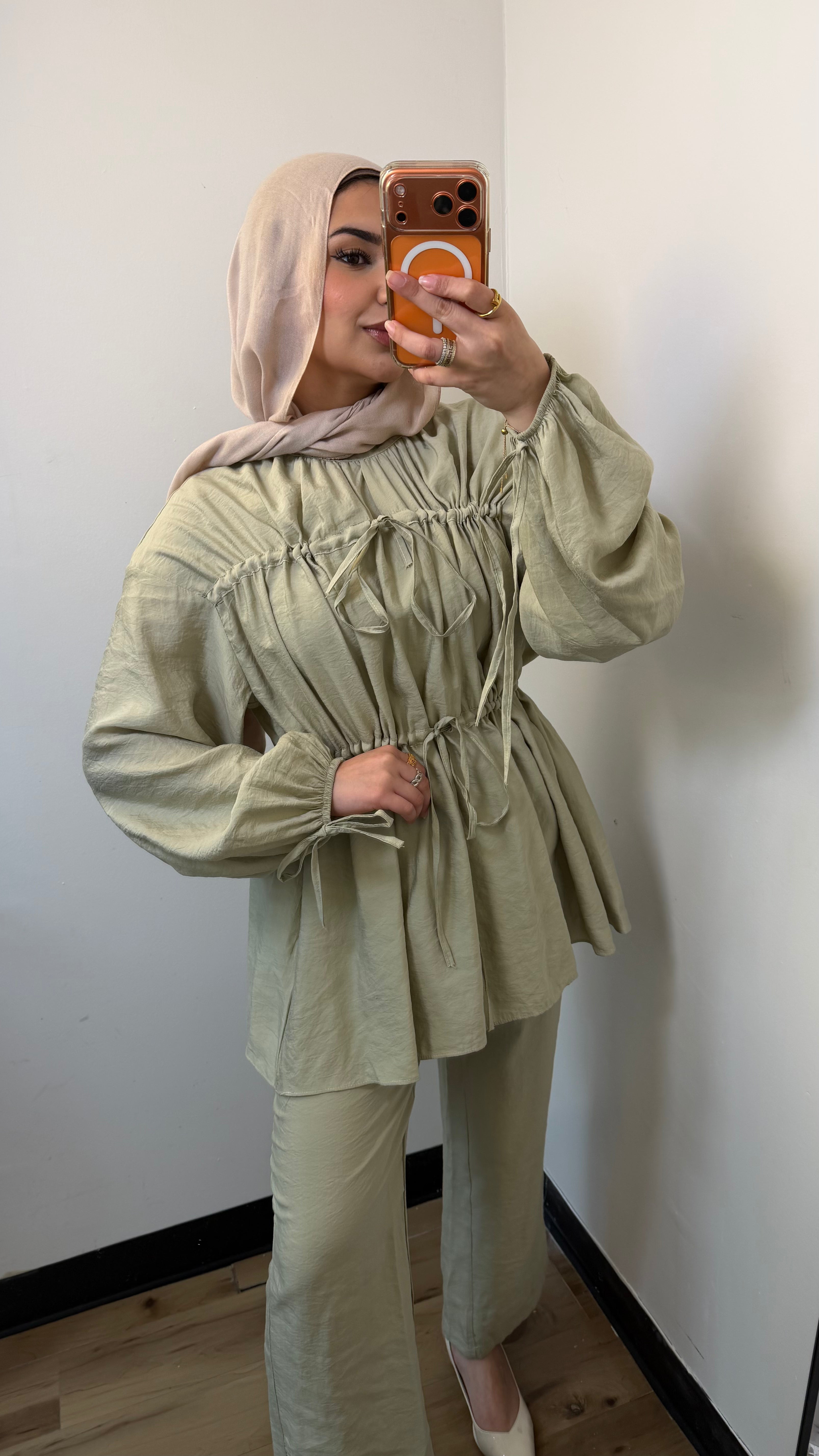 Nura Drawstring Ruffle Top